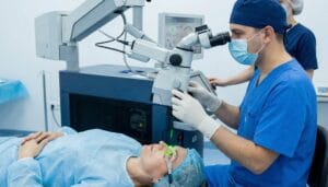 A professional performs precise surgery using lasers at a specialized eye care hospital in Vadodara.